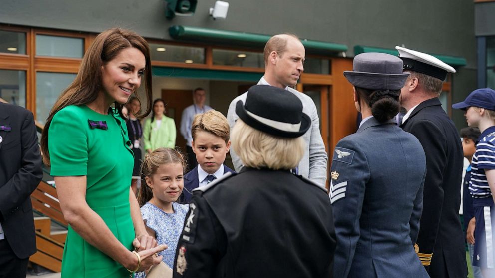 PHOTO: Catherine, Princess of Wales, Princess Charlotte, Prince George and Prince William, Prince of Wales arrive to attend day fourteen of the Wimbledon Tennis Championships, July 16, 2023, in London.