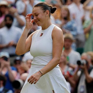 PHOTO: Amanda Anisimova of the U.S. looks dejected after losing the women's singles final against Poland's Iga Swiatek, July 12, 2025, in London.