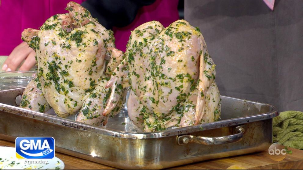 PHOTO: Carla Hall shows us how to make 'wine-can' chicken.