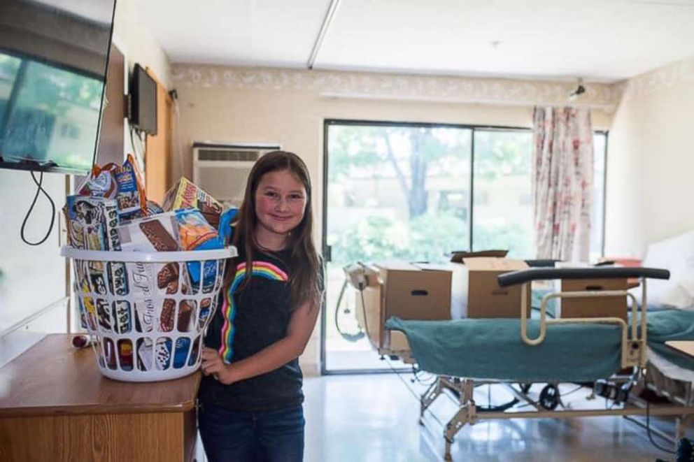 PHOTO: Ruby Kate Chitsey, 11, grants small wishes of nursing home residents like buying them snacks and arranging so their pets can visit them at the facility which they live at. 