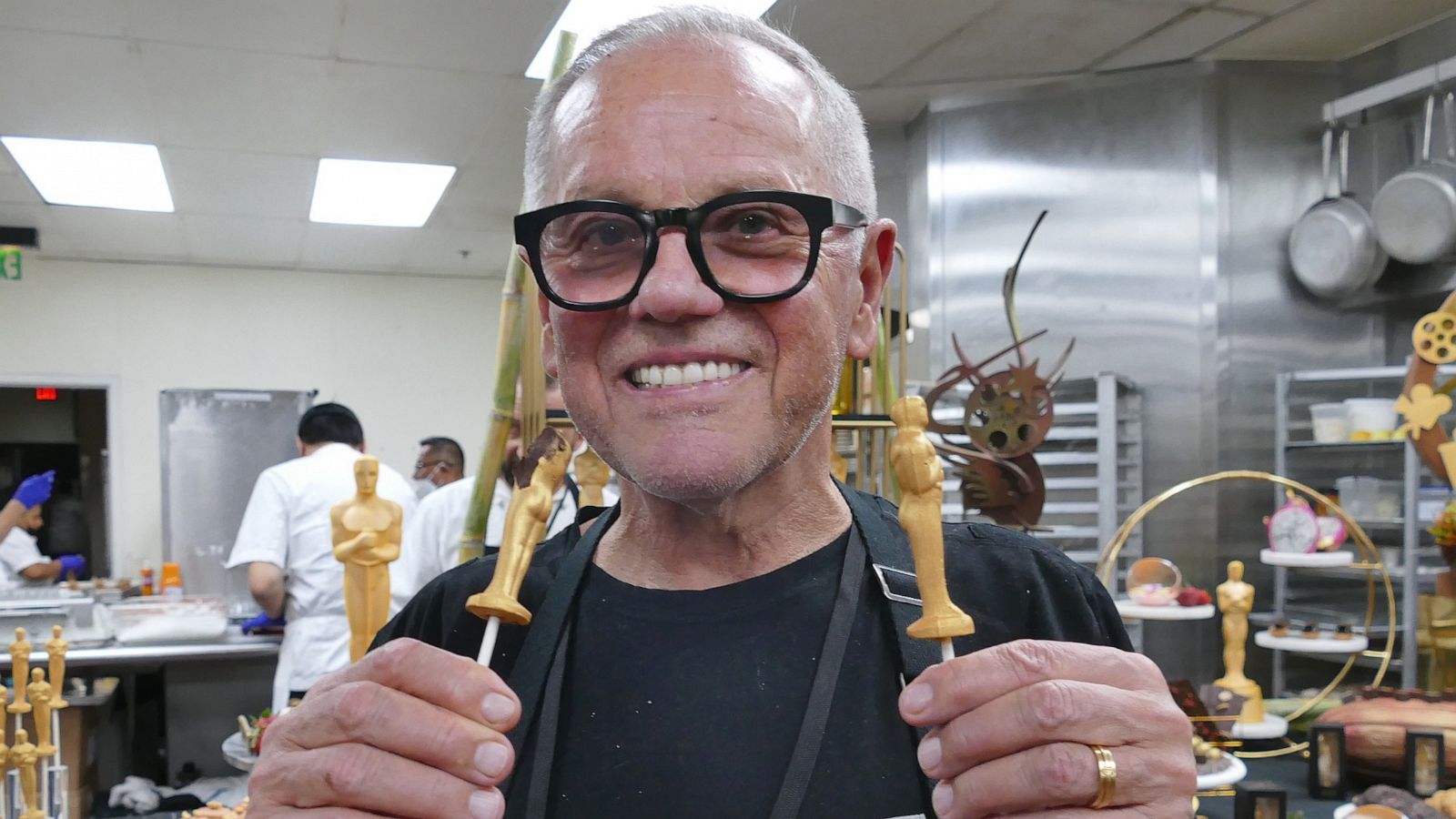 PHOTO: Chef Wolfgang Puck shows a creation in the shape of an Oscar trophy, in Los Angeles, Mar. 25, 2022.