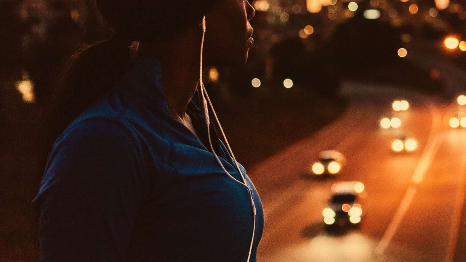 PHOTO: A woman jogger wearing earbuds is pictured in this undated stock photo.