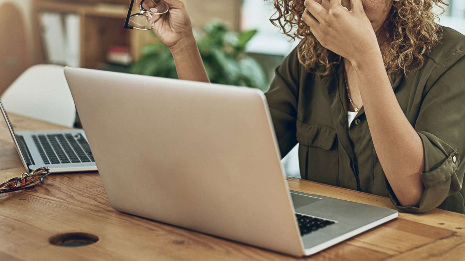 PHOTO: A woman uses a laptop in this stock photo.