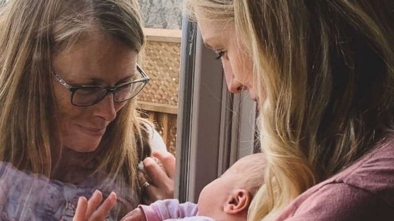 PHOTO: A Canada woman's powerful post on her mother meeting her newborn through a glass door is connecting parents who've experienced the same moment amid the novel coronavirus pandemic.