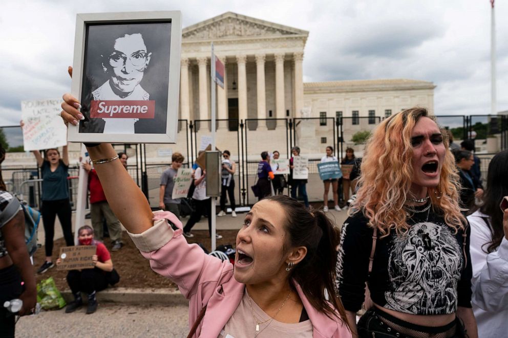 PHOTO: Demonstrators protest outside of the U.S. Supreme Court in Washington, May 5, 2022.