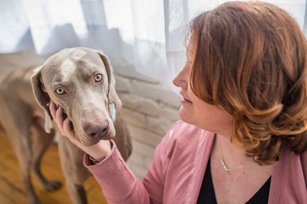 PHOTO: Lindsey with her dog Doug, a Weimaraner she rescued from the Pennsylvania SPCA