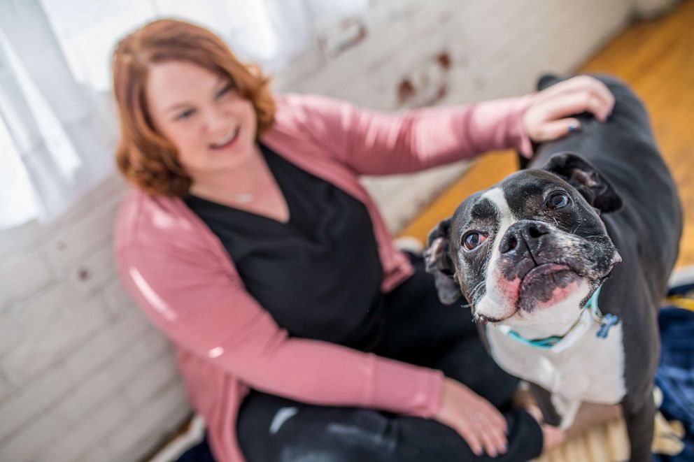 PHOTO: Lindsey with her dog Roman, a Boxer she rescued from the Pennsylvania SPCA