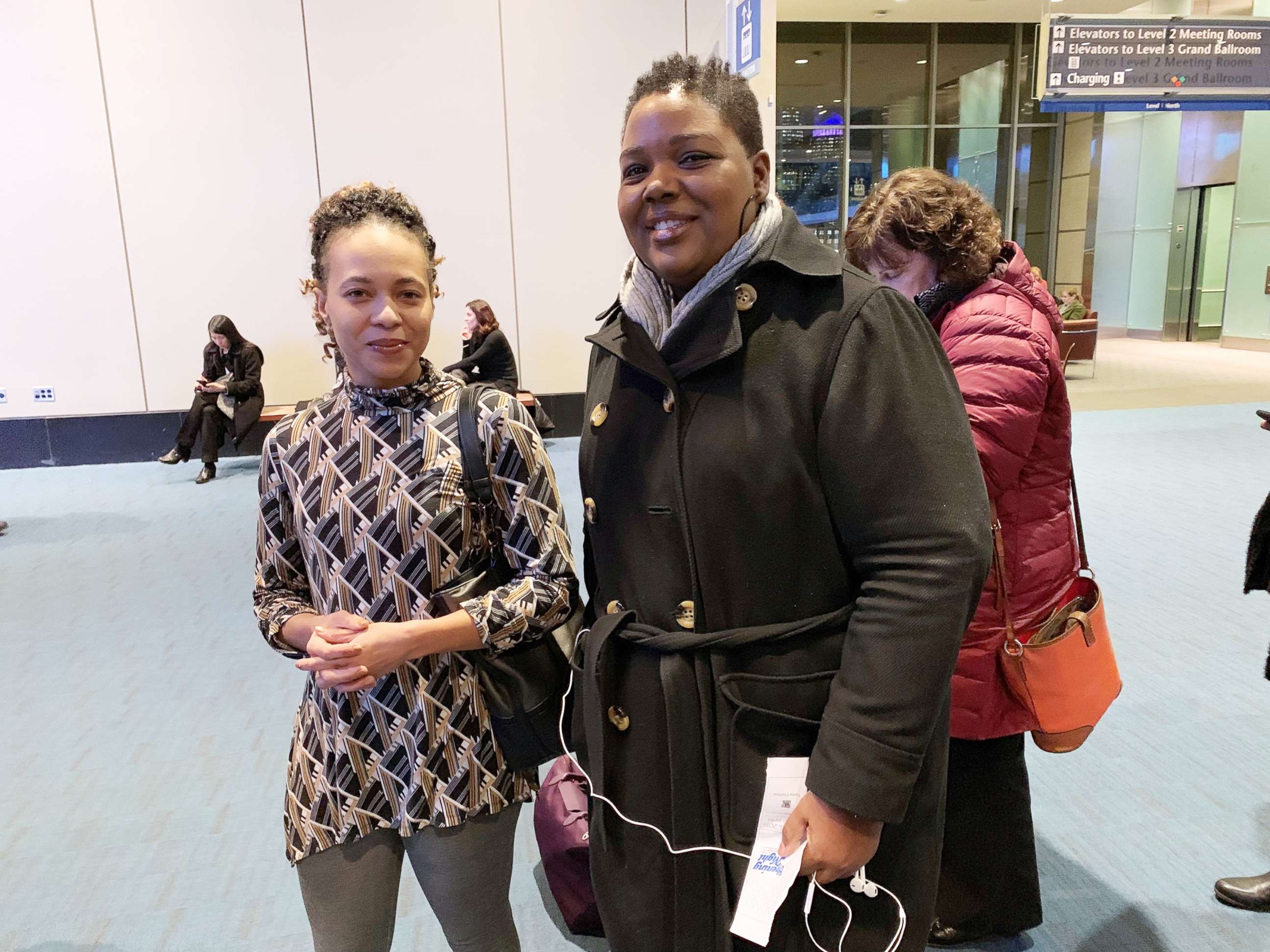 PHOTO: Femi Stoltz, left, and Tasha Crichlow, right, pose at opening night at the 2018 Massachusetts Conference for Women.