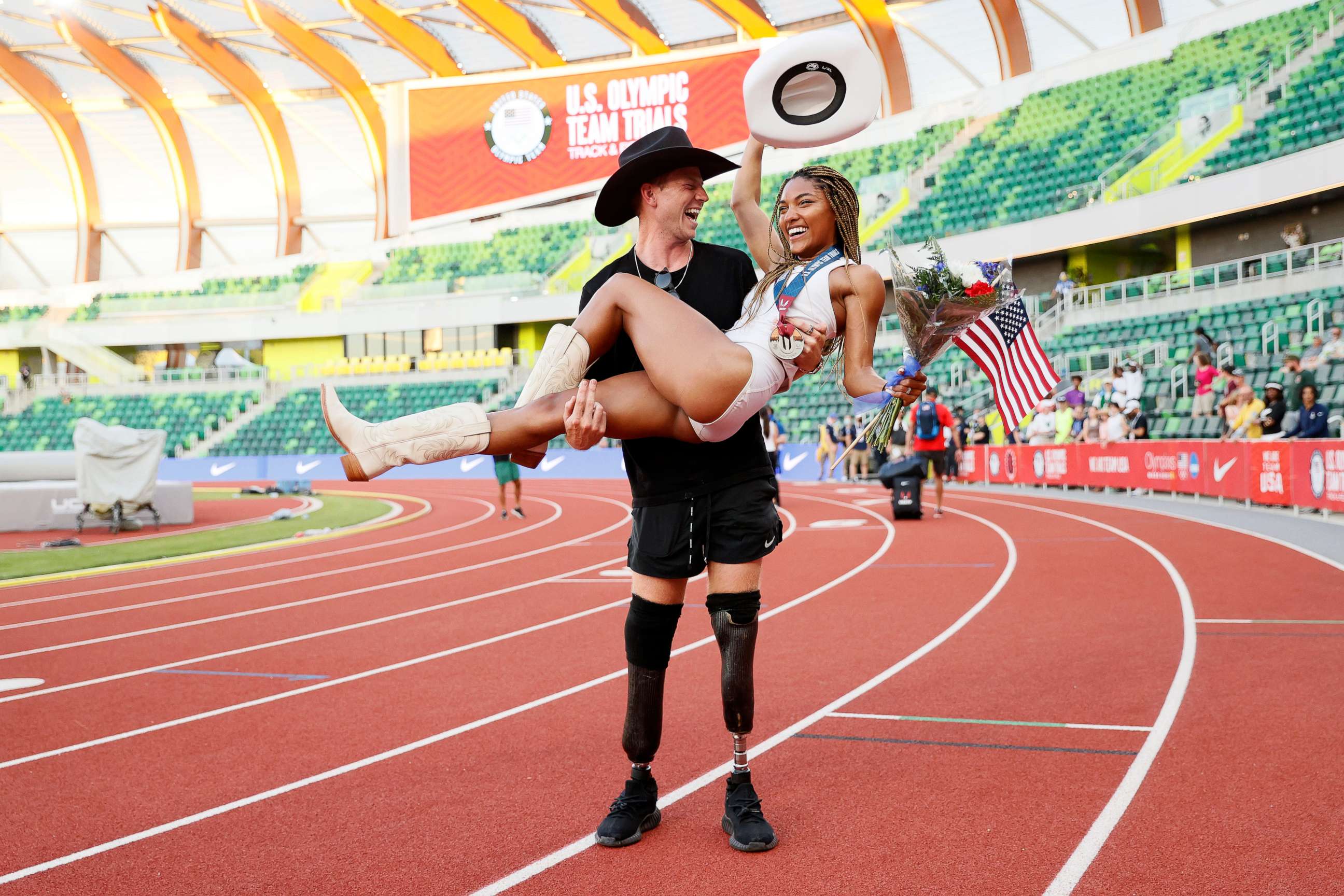 PHOTO: Tara Davis celebrates with boyfriend and Paralympian Hunter Woodhall at the 2021 U.S. Olympic Track & Field Team Trials at Hayward Field, June 26, 2021, in Eugene, Oregon.