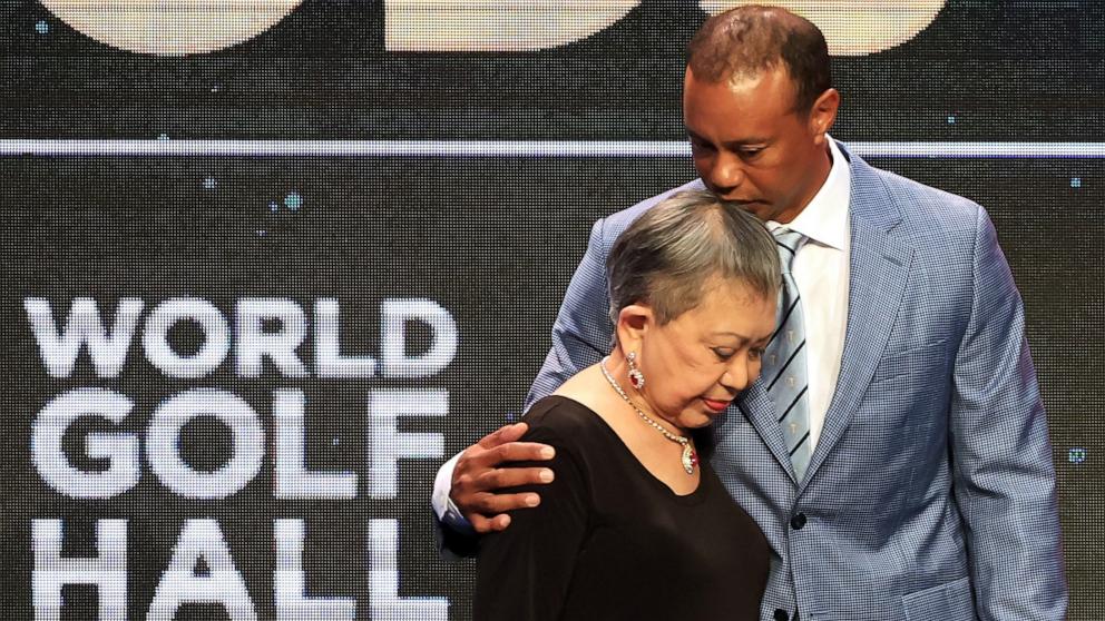 PHOTO: Tiger Woods and his mother Kultida Woods react as they pose for photos prior to his induction at the 2022 World Golf Hall of Fame Induction at the PGA TOUR Global Home on March 9, 2022 in Ponte Vedra Beach, Fla.