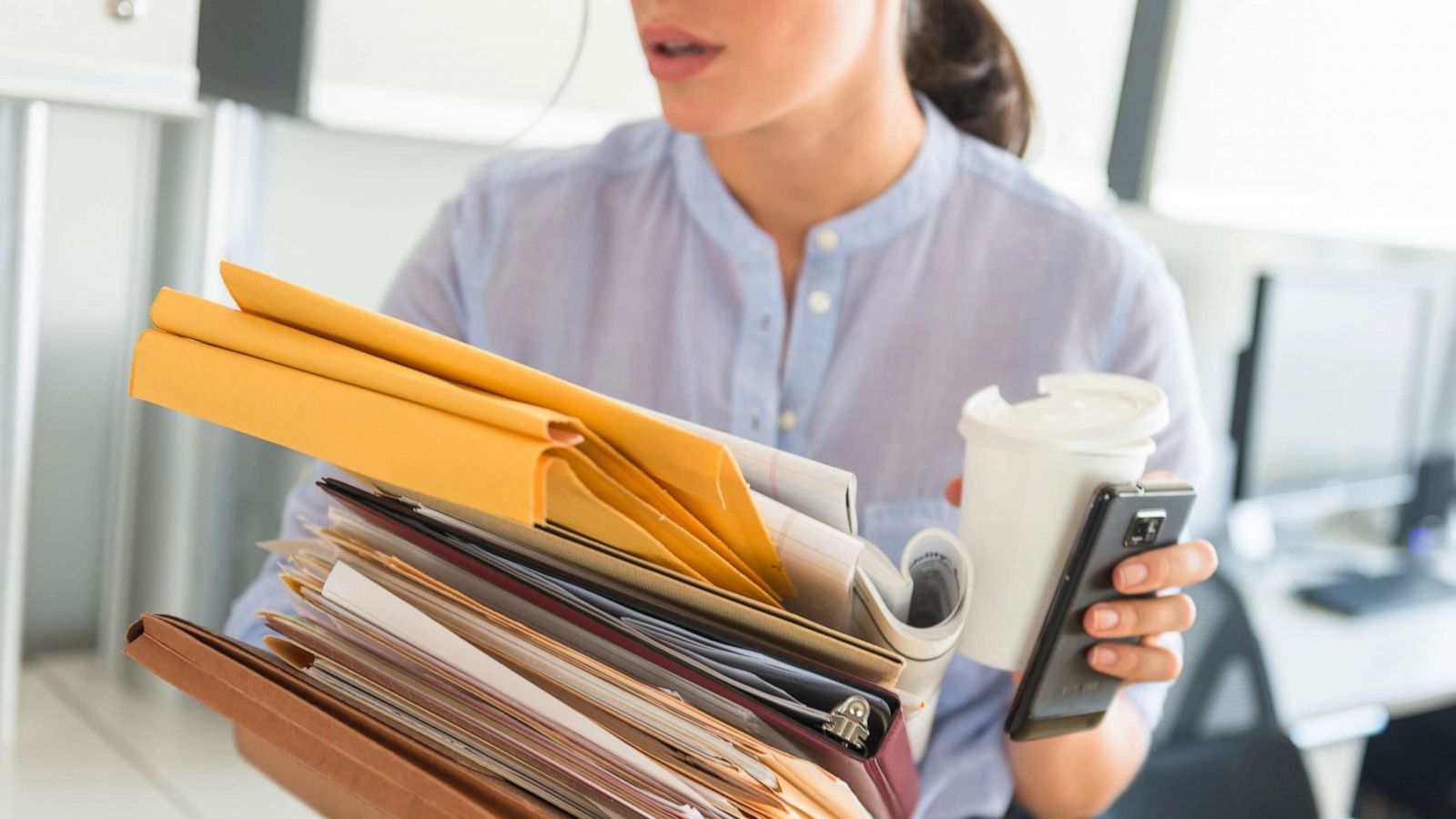 PHOTO: An undated stock photo of what appears to be an overworked business woman.