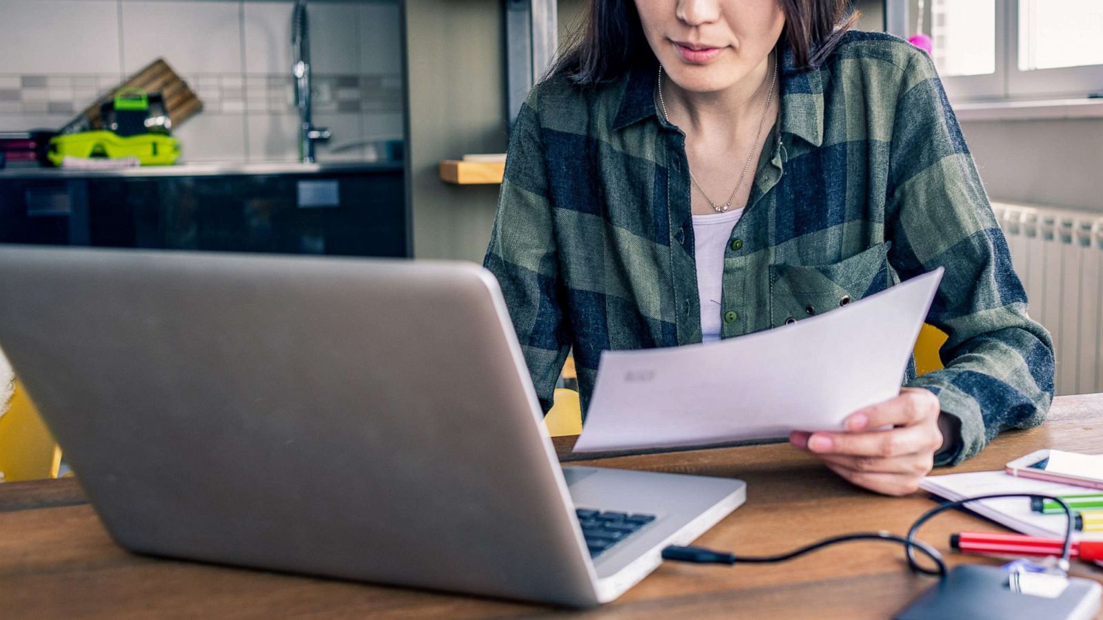 PHOTO: woman working from home.