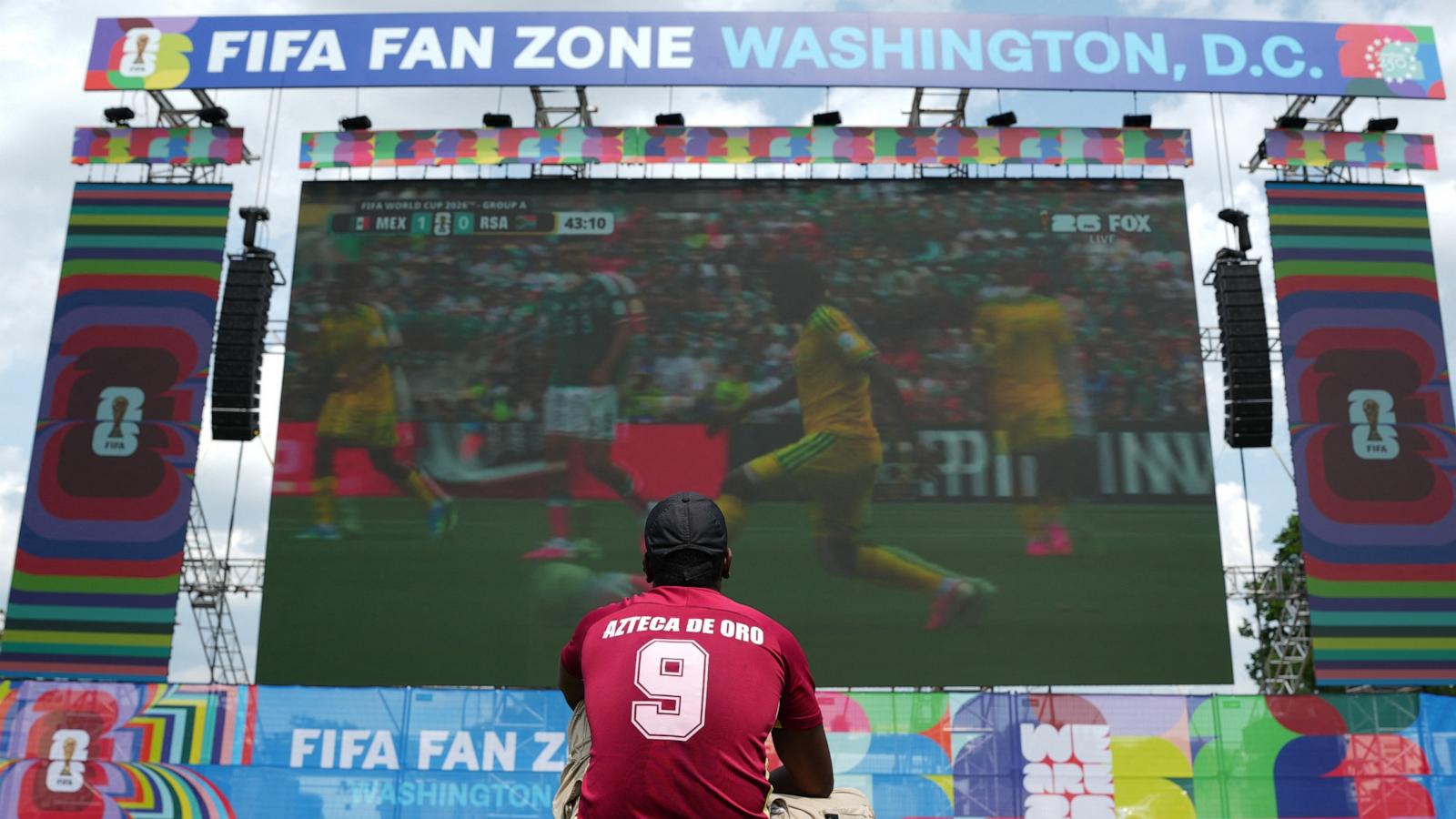 PHOTO: A FIFA World Cup 2026 fan watches a match in a fan zone in Washington D.C., June 11, 2026.