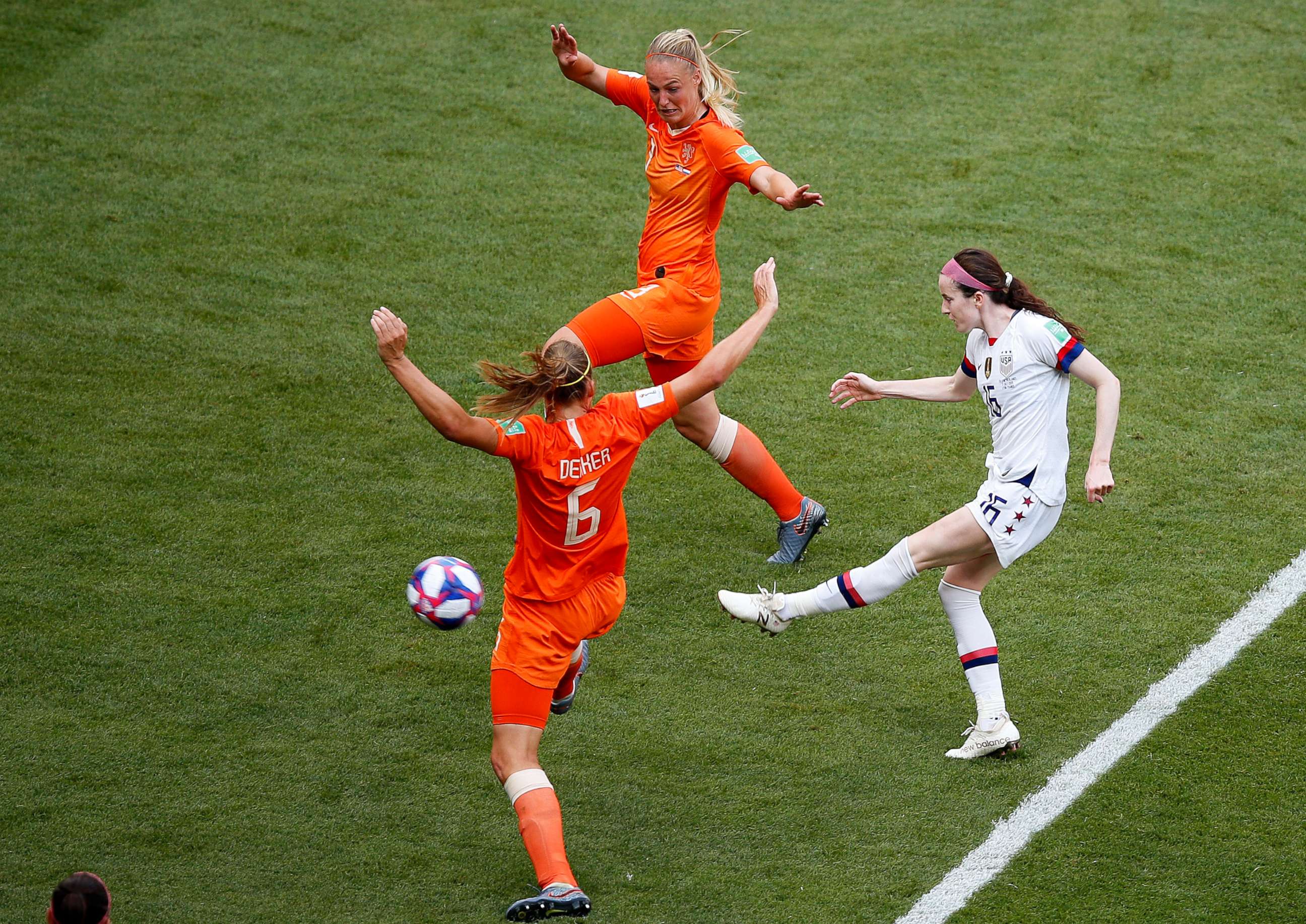 PHOTO: United States' Rose Lavelle, right, shoots to score her side's second goal during the Women's World Cup final soccer match between US and The Netherlands at the Stade de Lyon in Decines, France, July 7, 2019. 