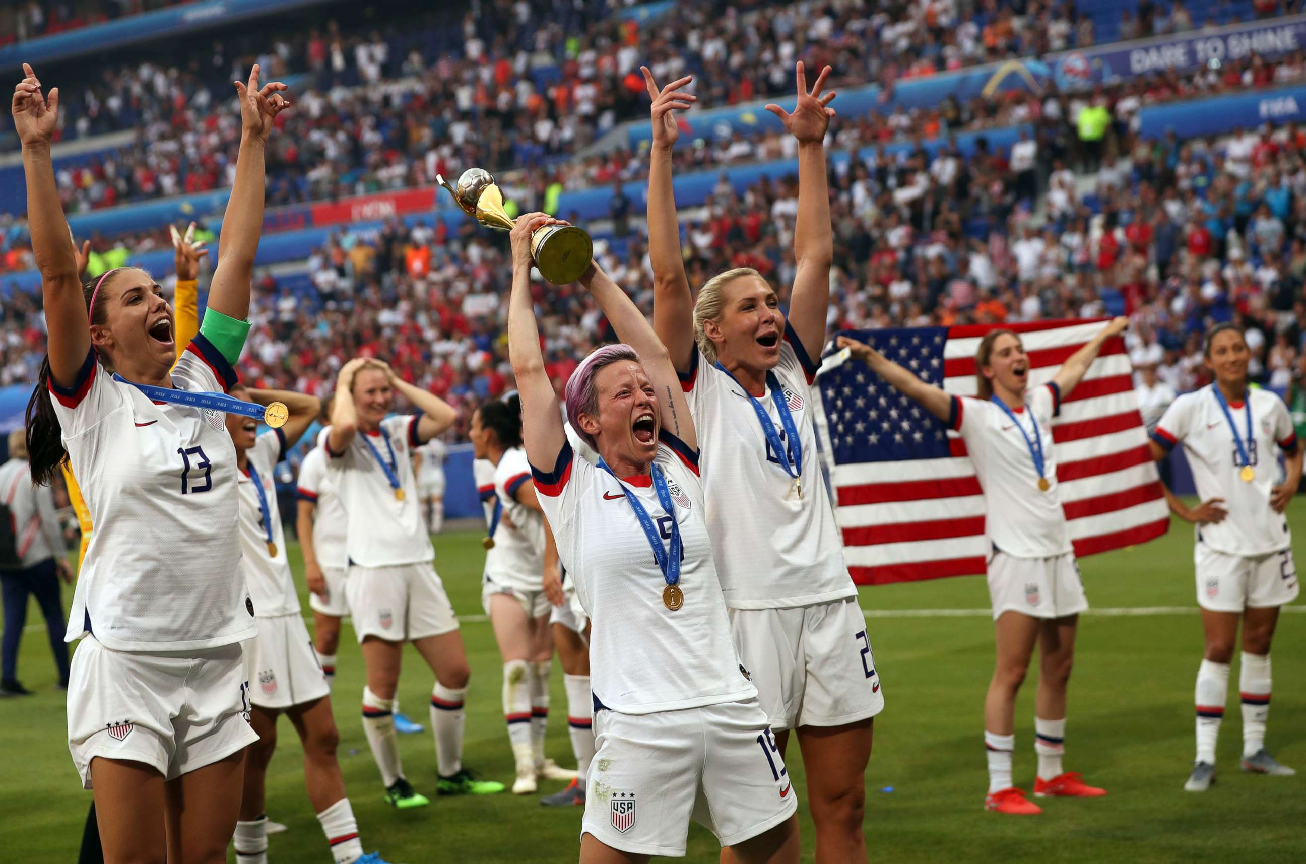 PHOTO: In this July 7, 2019, file photo, Megan Rapinoe holds the trophy celebrating at the end of the Women's World Cup final soccer match between US and The Netherlands at the Stade de Lyon in Decines, outside Lyon, France.