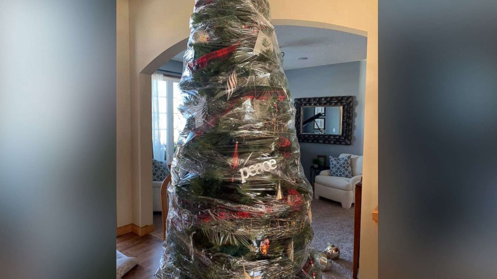 wrap christmas tree in saran wrap