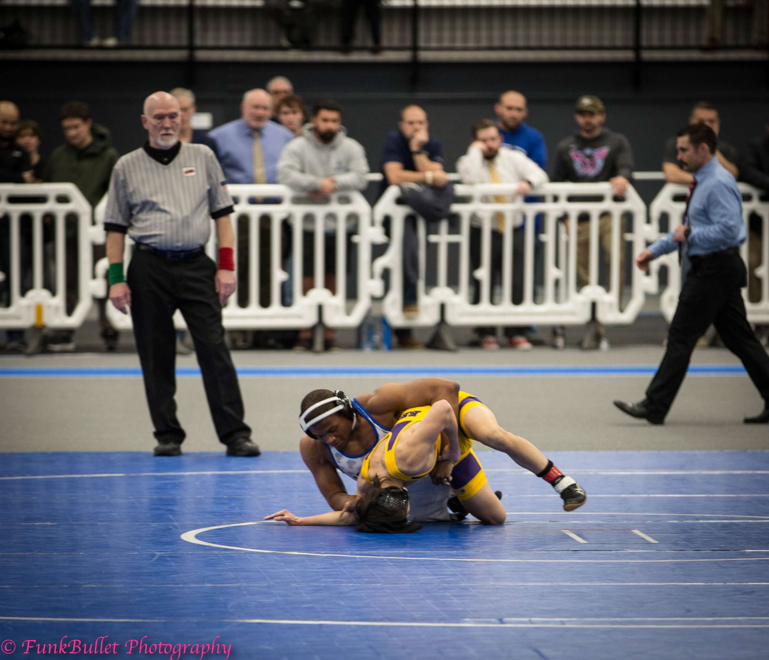 PHOTO: Adonis Lattimore wrestles an opponent during a high school match.