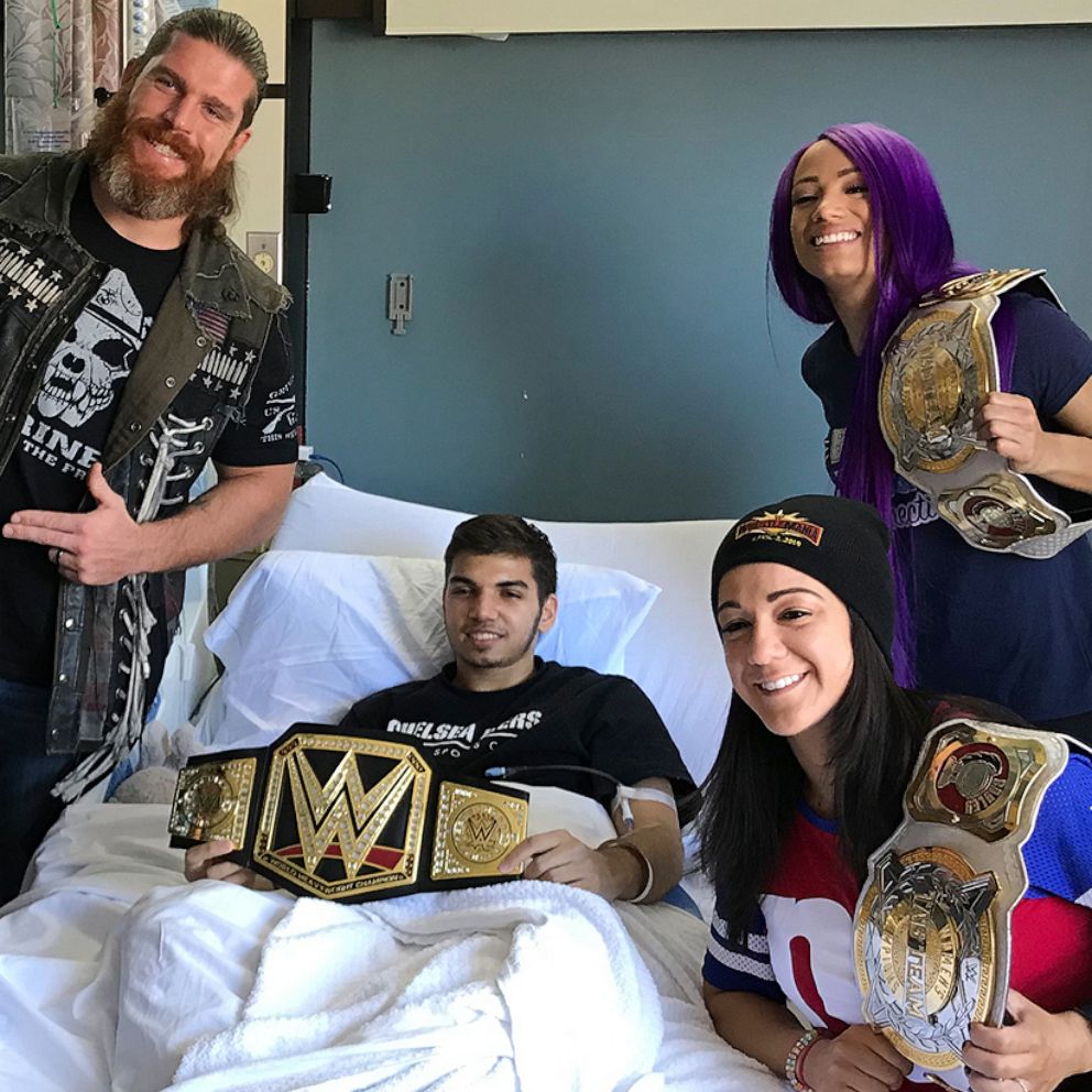 VIDEO: WWE Superstars visit children in the hospital ahead of WrestleMania