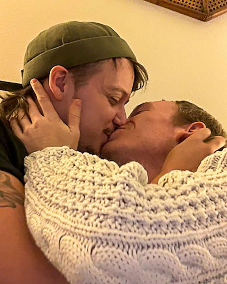 PHOTO: Daniel Aston kisses Wyatt Kent in an old photograph of the two. Aston was killed in the Club Q shooting in November 2022.