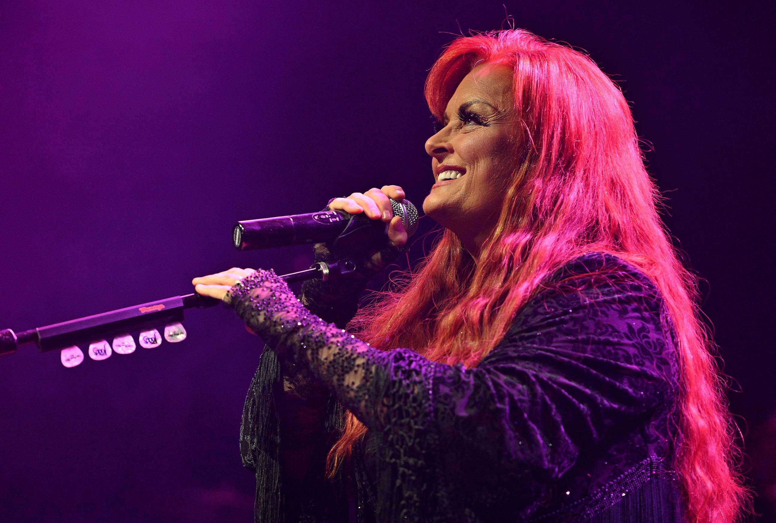 PHOTO: Wynonna Judd performing onstage during the Thundergong! Benefit Concert at the Uptown Theater, Nov. 12, 2022, in Kansas City, Mo.