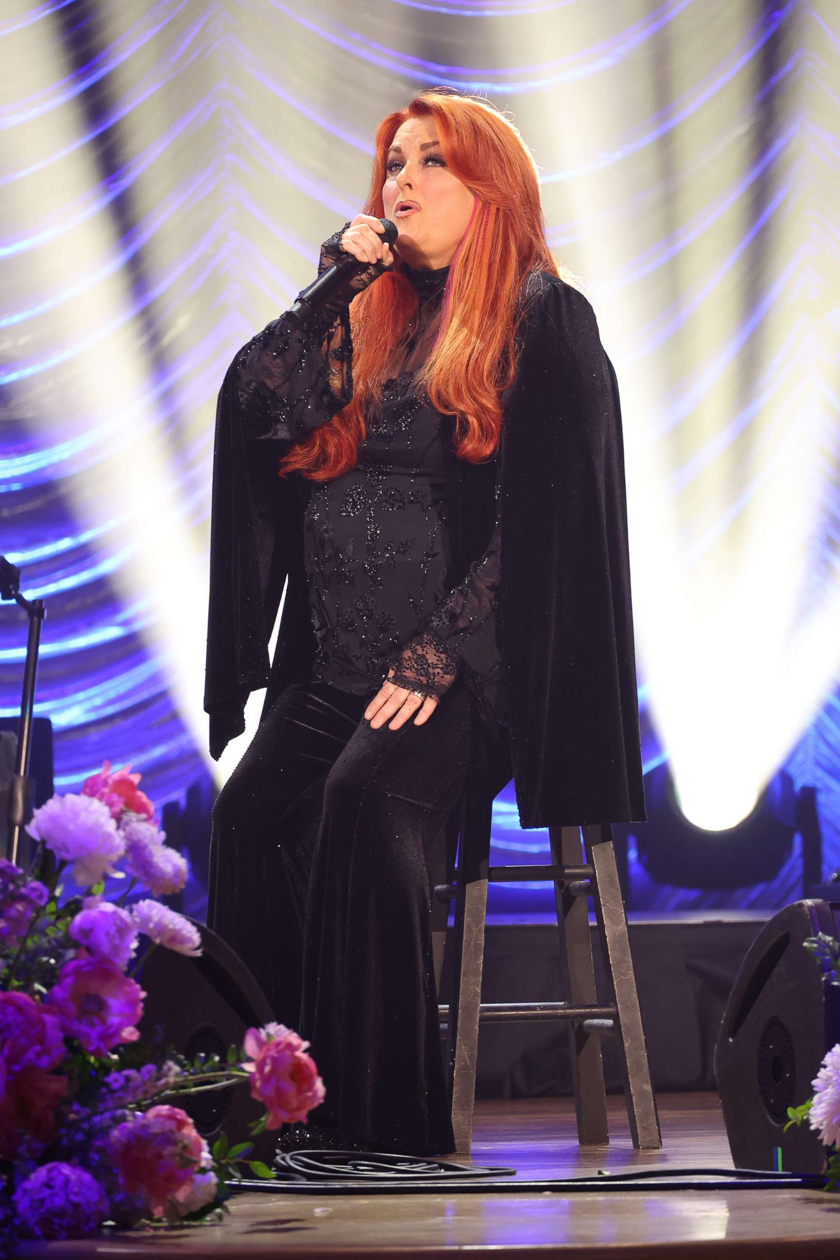 PHOTO: Wynonna Judd performs onstage during CMT and Sandbox Live's "Naomi Judd: A River Of Time Celebration" at Ryman Auditorium on May 15, 2022 in Nashville, Tenn.