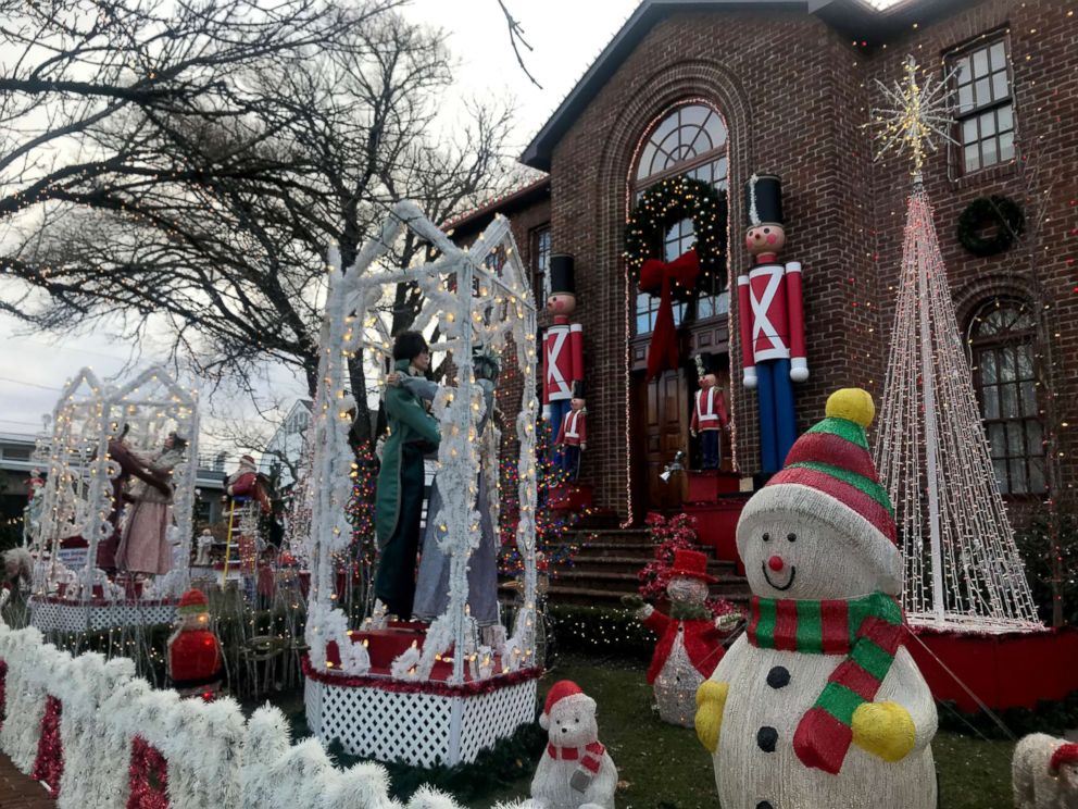 PHOTO: The Mure house in Rockaway Beach, New York is decked out for Christmas with a spectacular Santa's workshop scene.