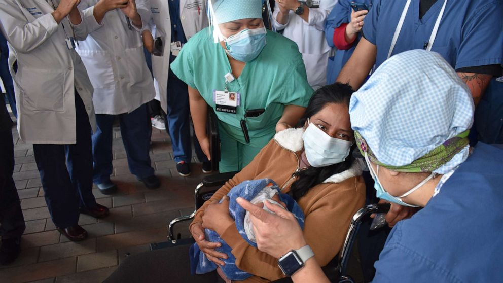 PHOTO: Yanira Soriano met her son, Walter, for the first time outside of Southside Hospital in Bay Shore, New York, on April 15, 2020.