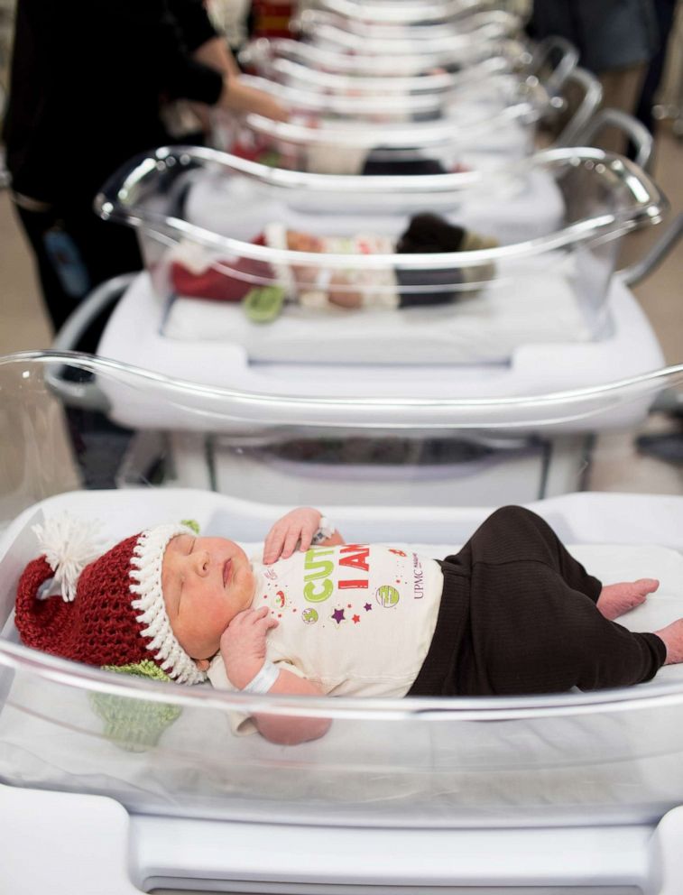 PHOTO: Newborns at UPMC Magee-Womens Hospital in Pittsburgh wear Santa hats with pointy green ears.