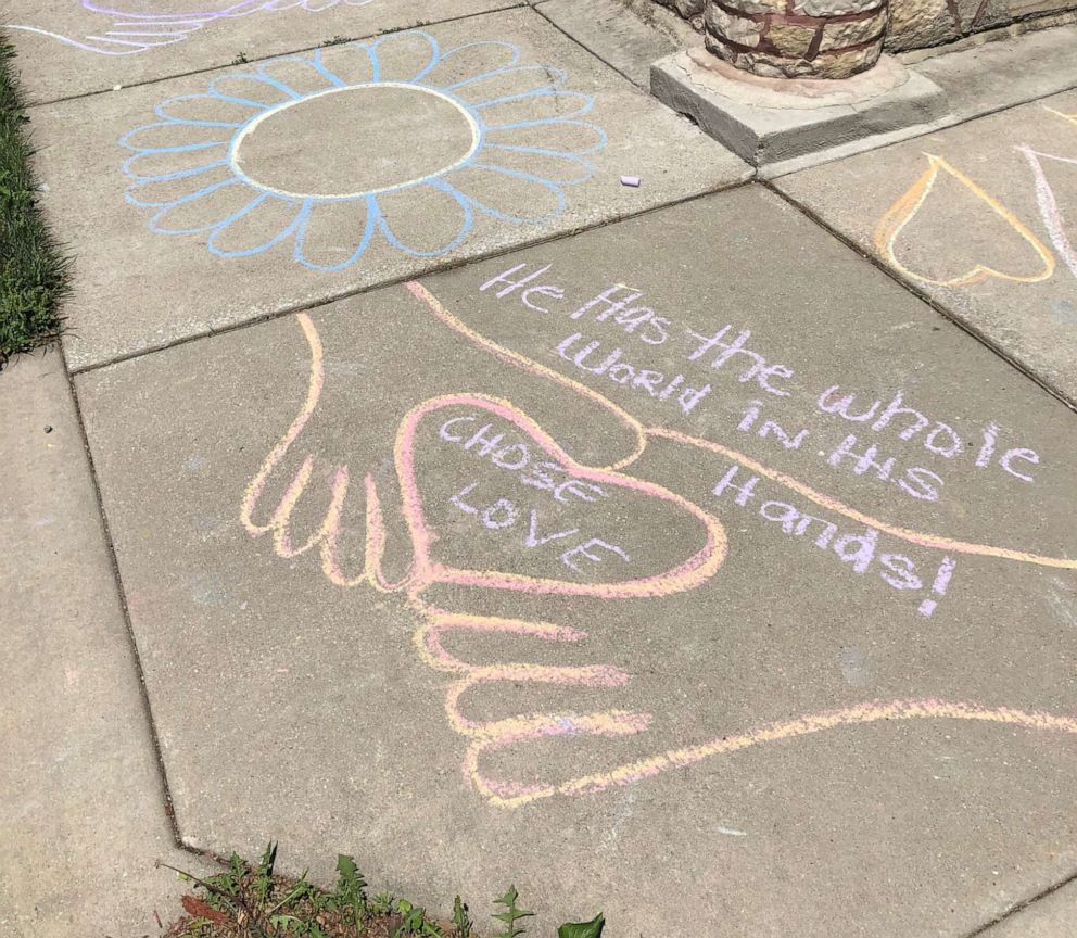 PHOTO: Aiden Kelley, 9, marched and made chalk drawings asked his neighbors to treat each other with respect and kindness in support of the Black Lives Matter movement outside his Chicago home in an undated handout photo.