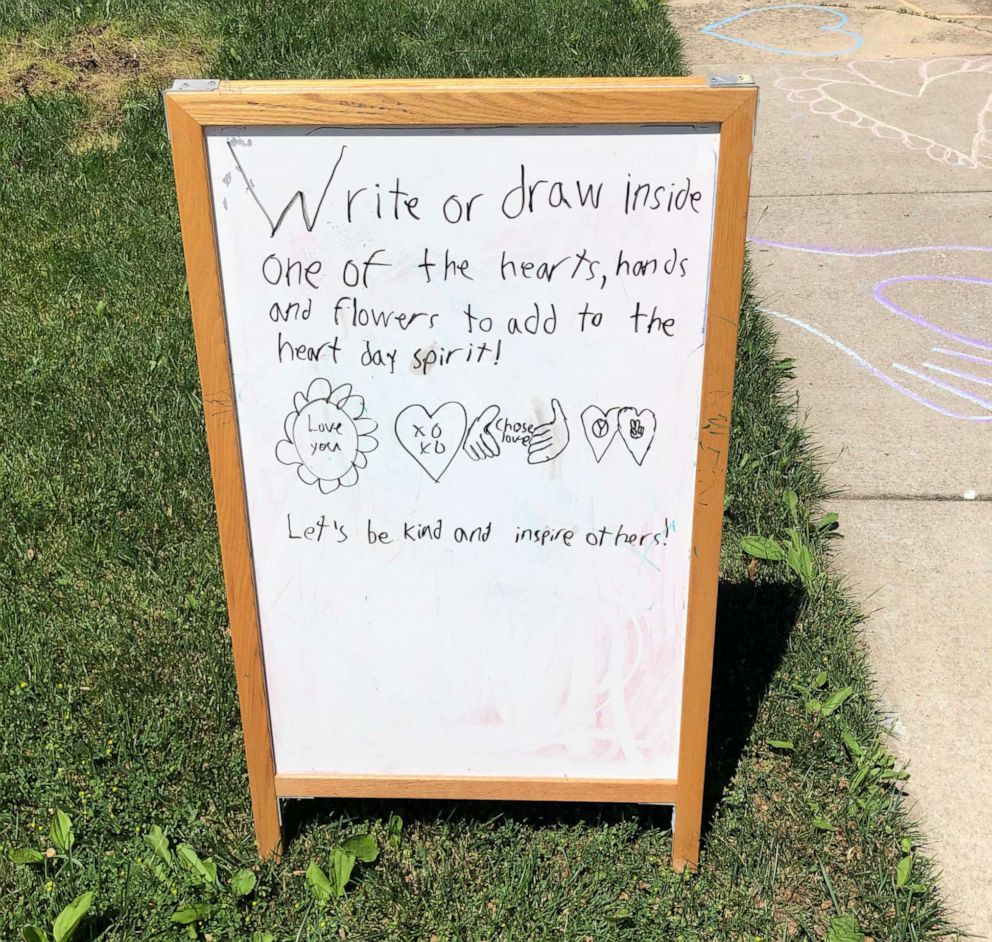 PHOTO: Aiden Kelley, 9, marched and made chalk drawings asked his neighbors to treat each other with respect and kindness in support of the Black Lives Matter movement outside his Chicago home in an undated handout photo.