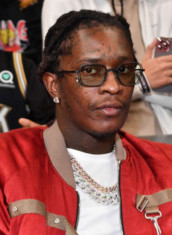 PHOTO: In this Feb. 3, 2022, file photo, Rapper Young Thug attends a game between the Phoenix Suns and the Atlanta Hawks at State Farm Arena in Atlanta.