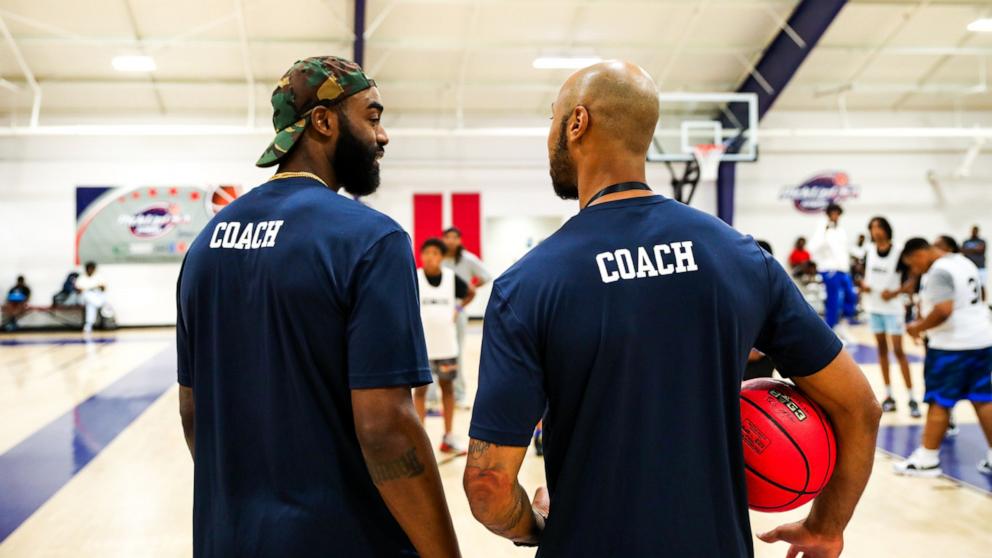 PHOTO: DaJuan Summers and Garlon Green serve as coaches for the Young3 basketball program.