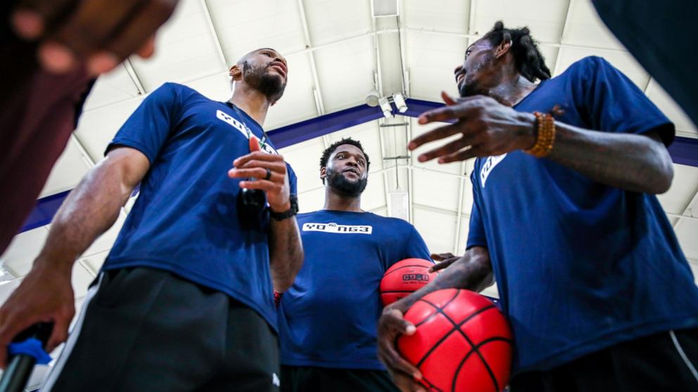 PHOTO: Young3 Players and Coaches (Garlon Green, Jaylen Johnson, and Mike Taylor)