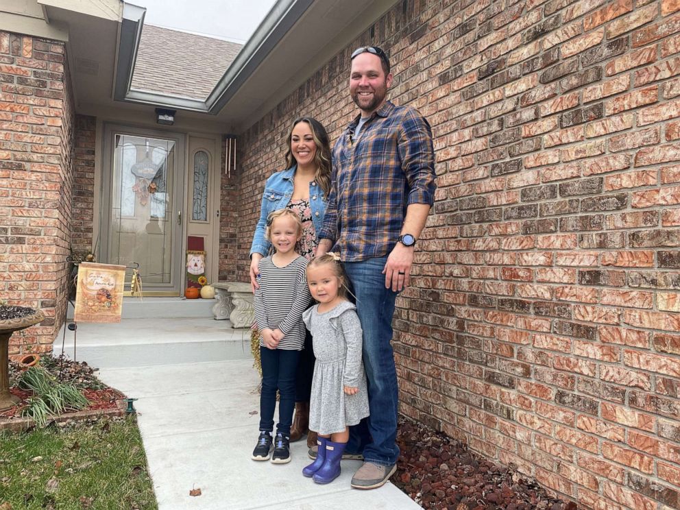 PHOTO: Zach and Autumn Carver, of Indiana, pose with their two daughters, Harlow and Sadie.