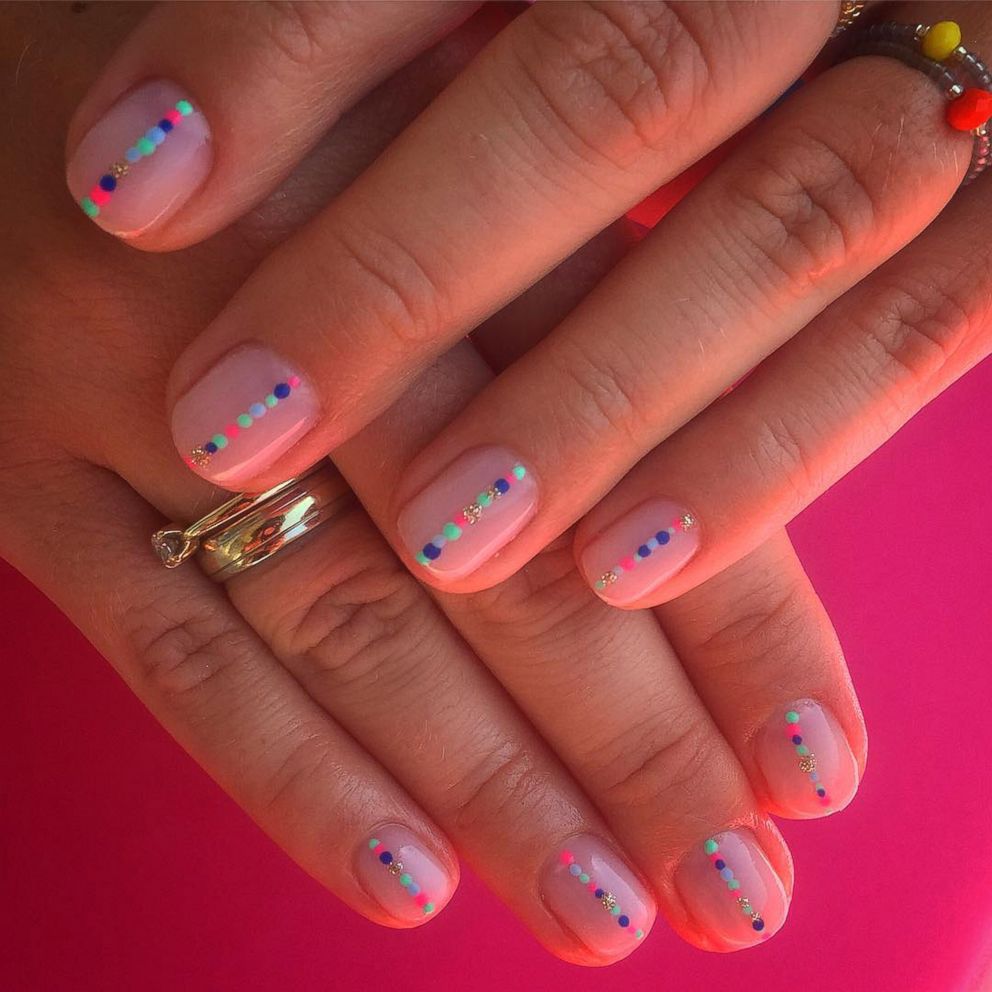PHOTO: The negative space nail trend is one of our favorites of the year.