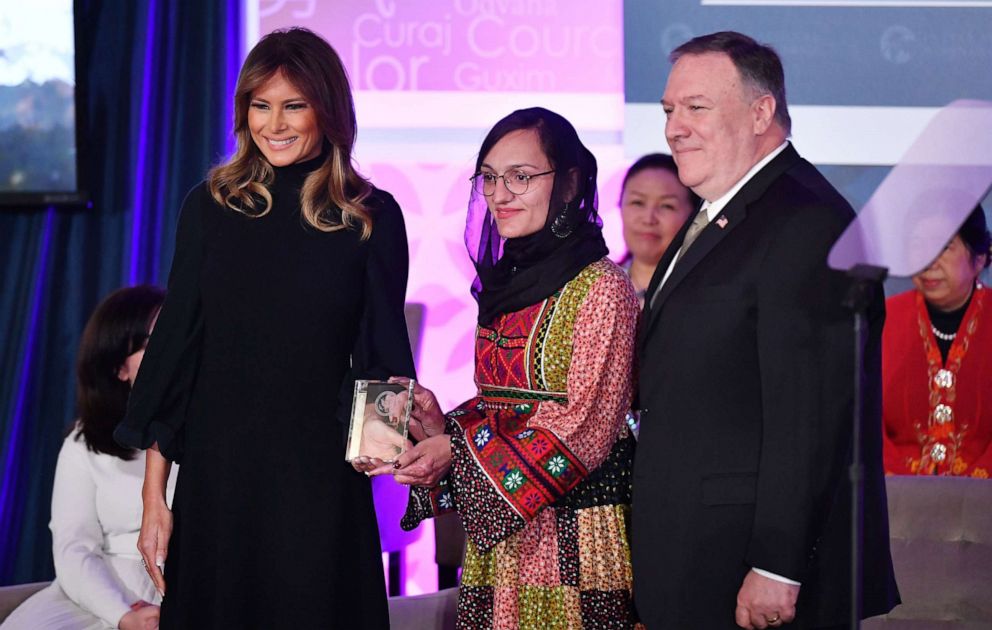 PHOTO: International Women of Courage (IWOC) Award recipient Zarifa Ghafari of Afghanistan poses with US Secretary of State Mike Pompeo (R) and First Lady Melania Trump at the State Department in Washington, March 4, 2020.