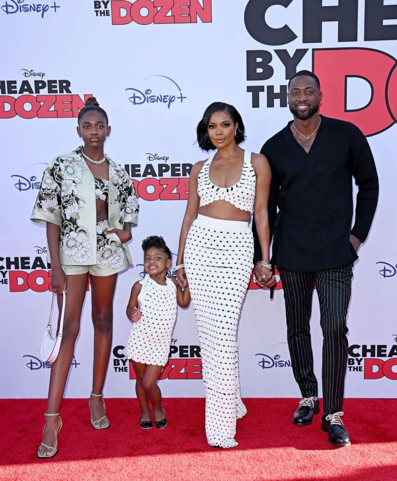 PHOTO: Zaya Wade, Kaavia James Union Wade, Gabrielle Union, and Dwyane Wade attend the Premiere of Disney's "Cheaper By The Dozen" on March 16, 2022 in Los Angeles.