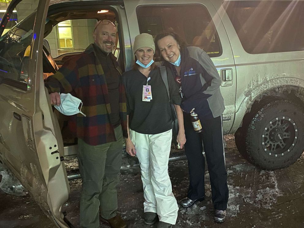 PHOTO: Dr. John Loyd, far left, chief of neonatology at Dell Children's, poses with the two nurses he traveled with in a snowstorm to help save the life of a premature baby.
