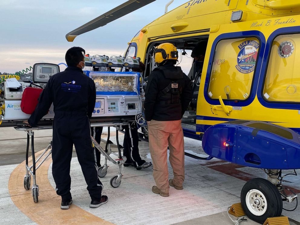 PHOTO: Healthcare providers transfer baby Zaylynn onto a medical helicopter.