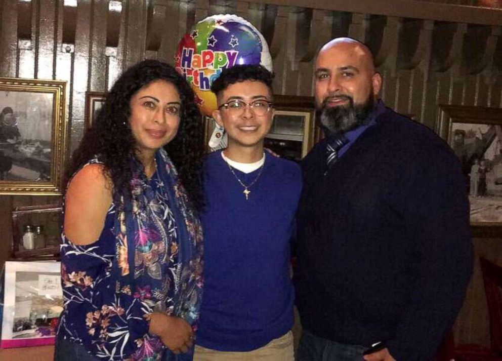 PHOTO:  Zeke Acosta and his parents celebrating a birthday.
