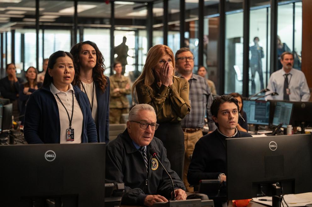 PHOTO: (L-R) Eden Lee as Agent Angela Kim, Mozhan Navabi as Melissa Kornblau, Robert De Niro as George Mullen, Connie Britton as Valerie Whitesell, Jay Klaitz as Tim Pennington and Ignacio Diaz-Silverio as Cesar Rocha are seen in a still from "Zero Day." 