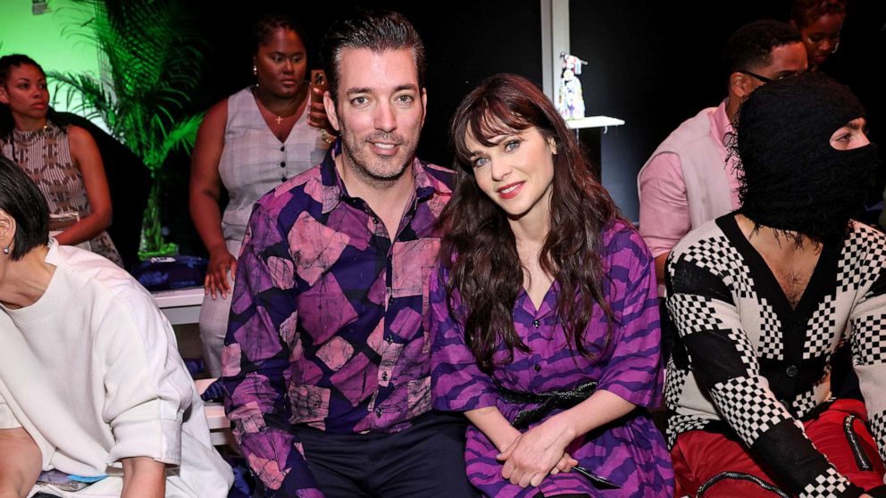 PHOTO: Jonathan Scott and Zooey Deschanel attend the Studio 189 Spring Summer 2024 Collection Fashion Show during New York Fashion Week - September 2023: The Shows at Spring Studios on Sept. 10, 2023 in New York City.