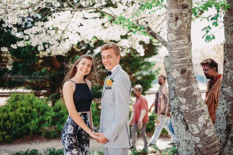 PHOTO:  Georgia high school students Ethan and Leah were photobombed by zombies near the set of "The Walking Dead" before their prom.