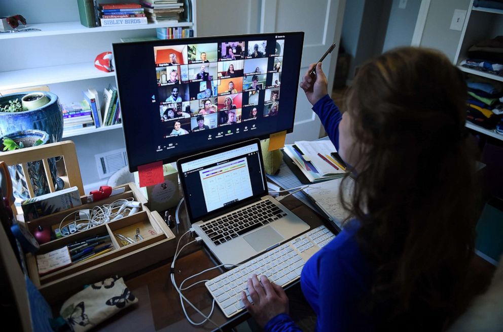 PHOTO: Lauryn Morley, a substitute teacher for the Washington Waldorf School in Bethesda, Maryland, works from her home due to the Coronavirus outbreak, on April 1, 2020 in Arlington, Virginia.