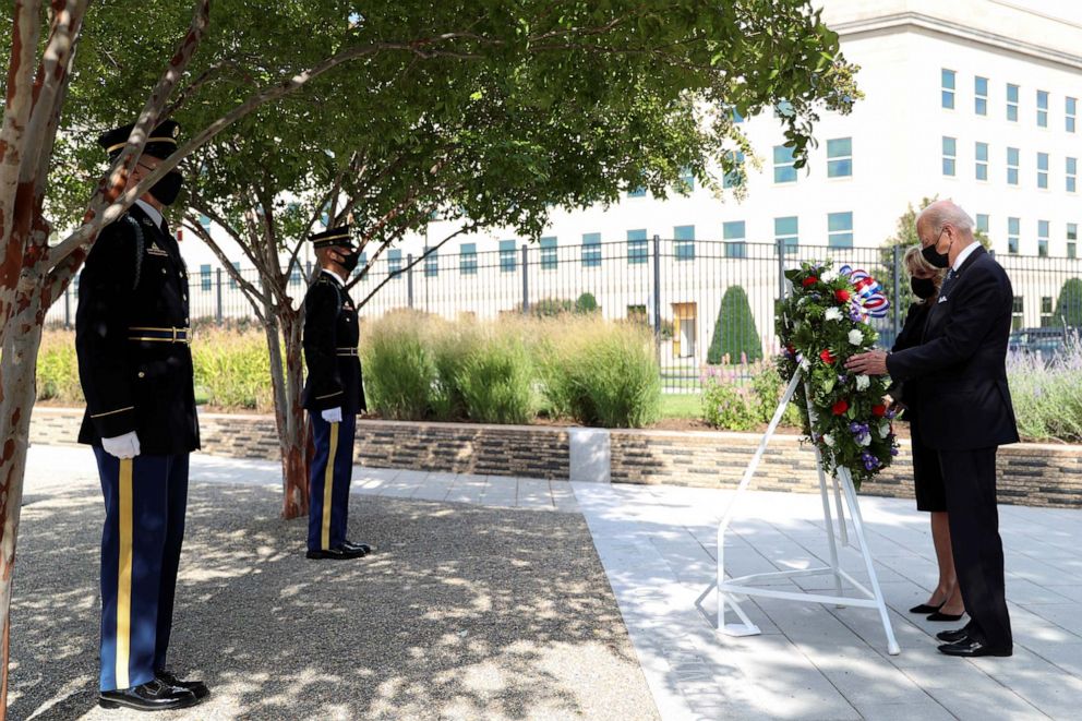 PHOTO: President Joe Biden and first lady Jill Biden lay a wreath at the Pentagon on the 20th anniversary of the September 11, 2001 attacks in Arlington, Va., Sept. 11, 2021. 