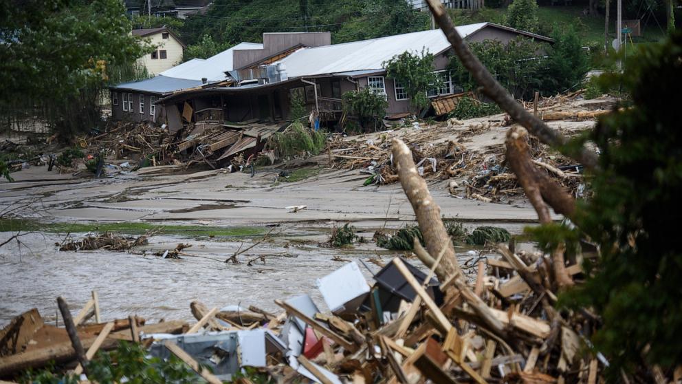 PHOTO: The Rocky Broad River flows into Lake Lure and overflows the town with debris from Chimney Rock after heavy rains from Hurricane Helene, Lake Lure, NC, Sept. 28, 2024.