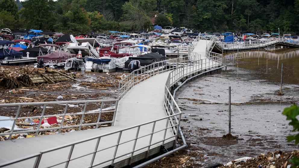 PHOTO: The Rocky Broad River flows into Lake Lure and overflows the town with debris from Chimney Rock after heavy rains from Hurricane Helene in Lake Lure, NC, Sept. 28, 2024.