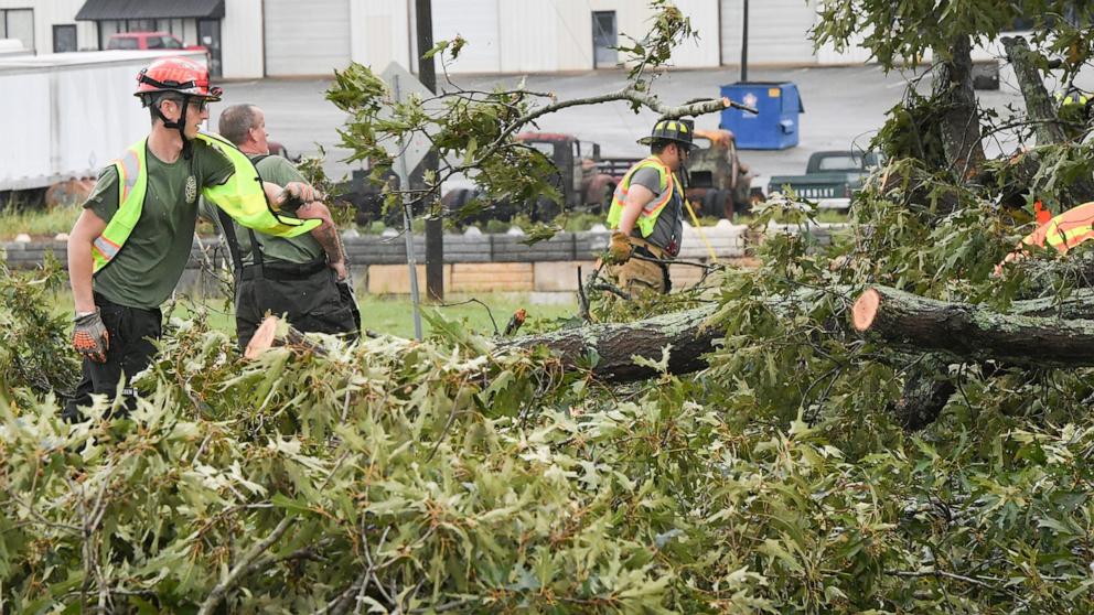 PHOTO: Whitefield Fire Station of Anderson County remove a fallen tree from US 29 near the Jockey Lot, during Tropical Storm Helene in Williamston, S.C., Sept. 27, 2024.