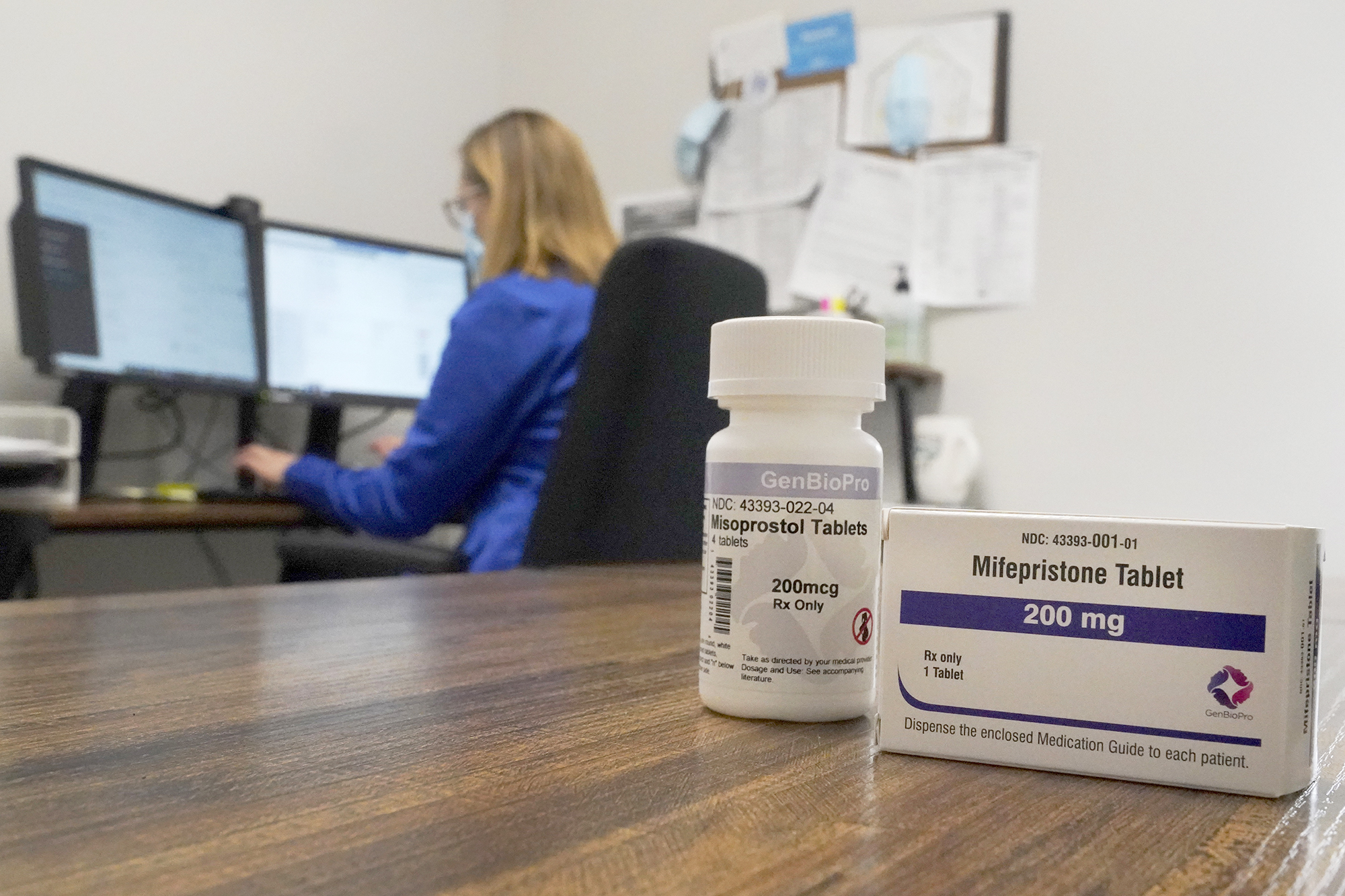 PHOTO: A Nurse Practitioner works in an office at a Planned Parenthood clinic as containers of the medication used to end an early pregnancy sits on a table in Fairview Heights, Ill., Oct. 29, 2021.