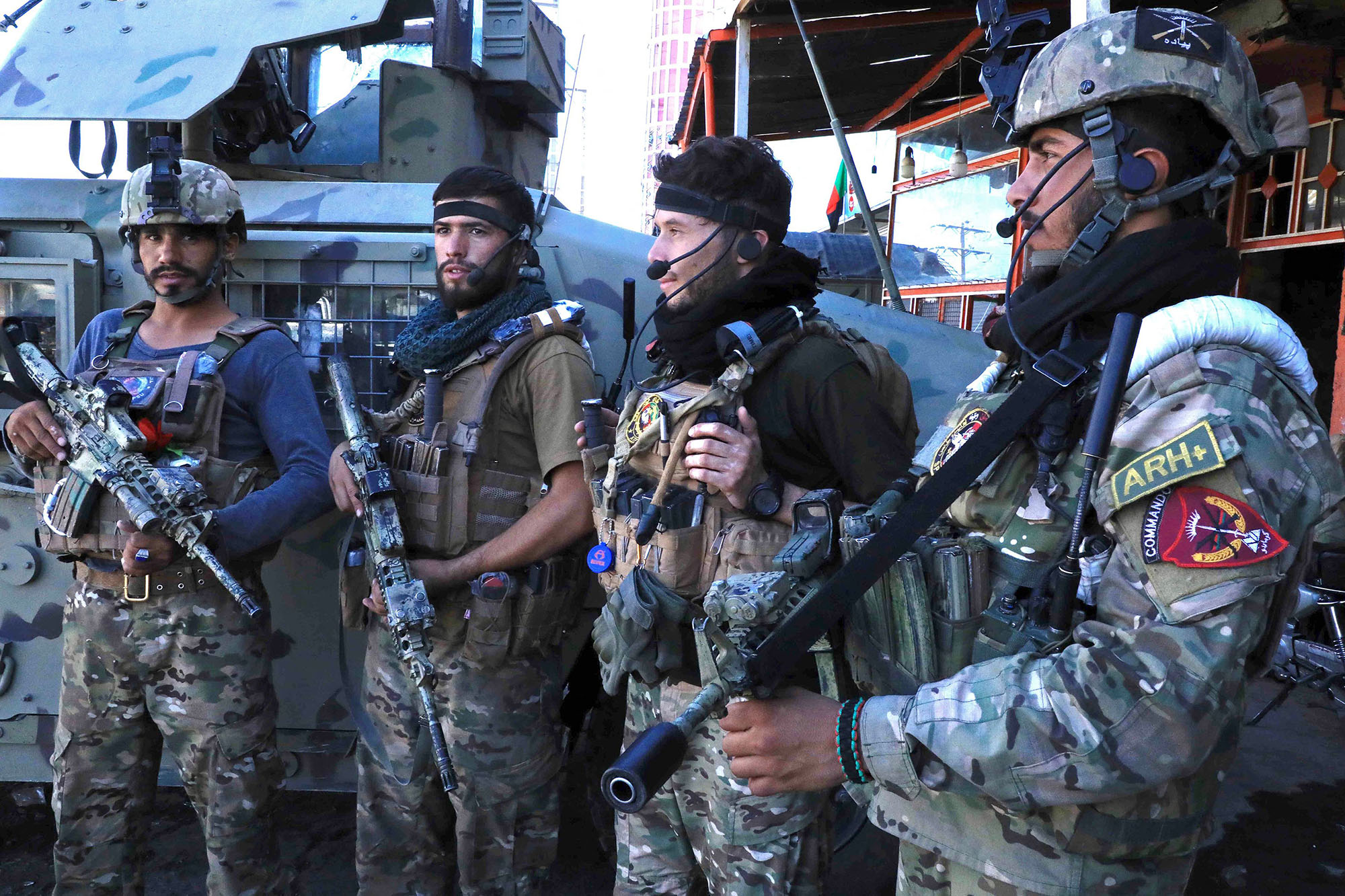 PHOTO: Afghan security force personnel stand guard along the roadside in Herat,  Aug. 12, 2021.